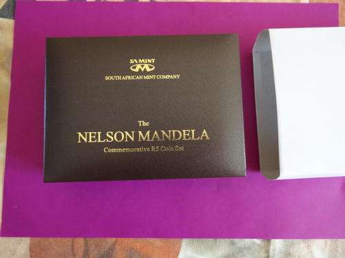 NELSON MANDELA COMMEMORATIVE SET. THE CASE IS IN MINT CONDITION.